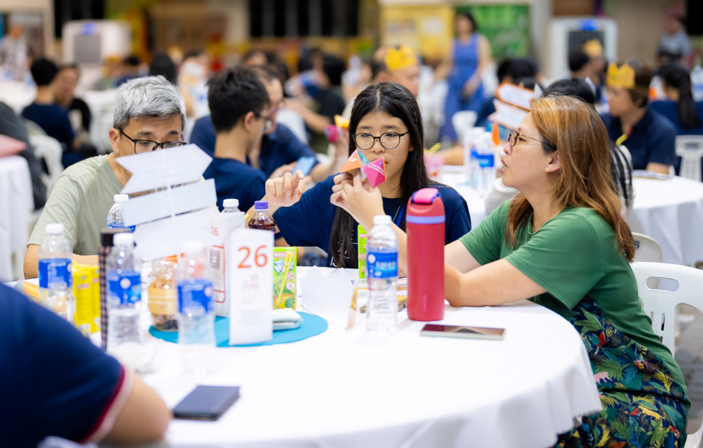 Photo of a family bonding over an event